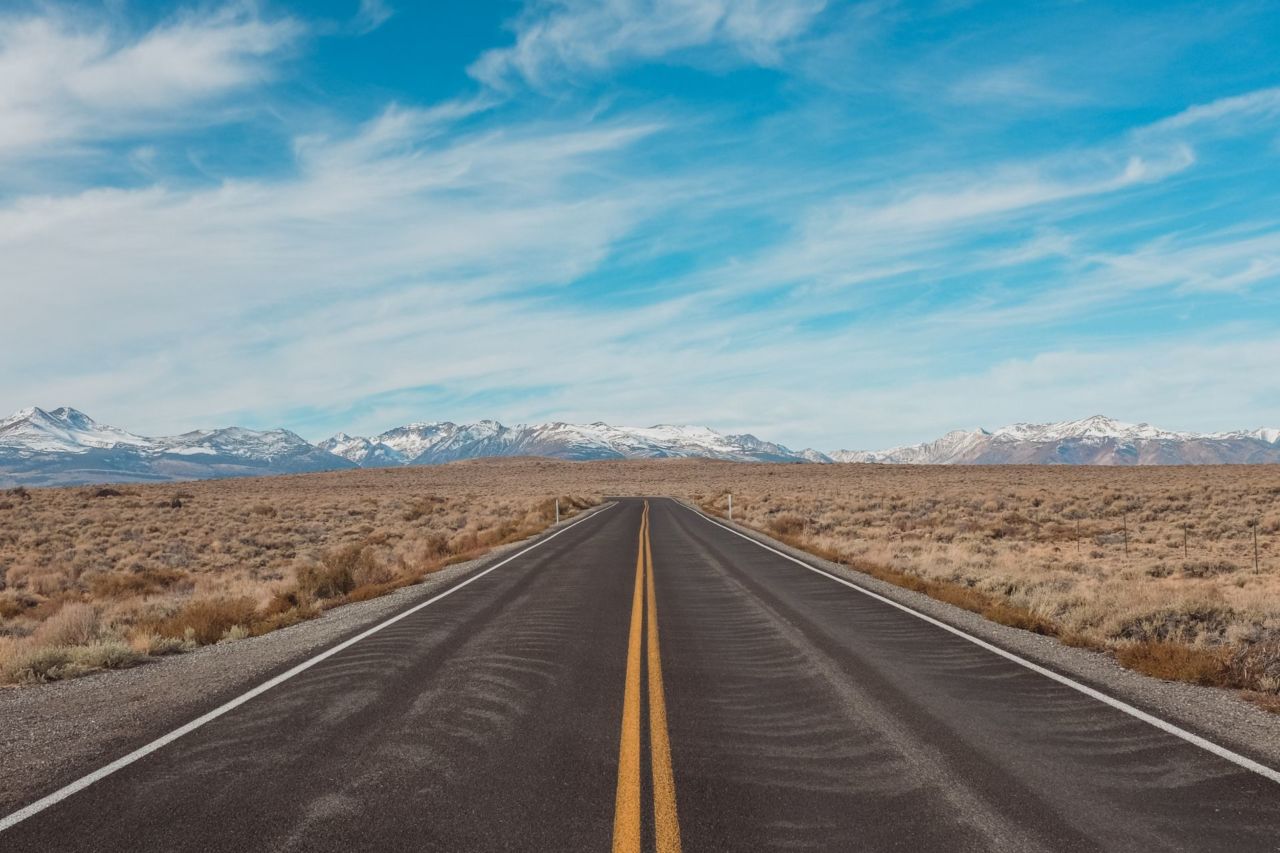 A close up of a desert road